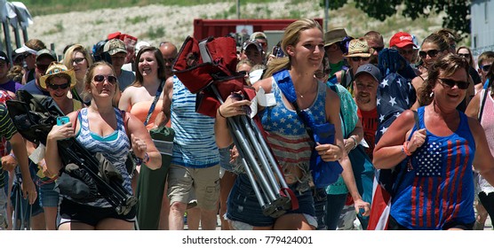 Manhattan, Kansas, USA, 27th June, 2015
Concert Goers Stampede Thru The Gate To Get Front Row Seating At The Annual Kicker Country Stampede Concert At The Tuttle Creek State Park
 