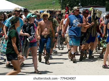 Manhattan, Kansas, USA, 27th June, 2015
Concert Goers Stampede Thru The Gate To Get Front Row Seating At The Annual Kicker Country Stampede Concert At The Tuttle Creek State Park
 