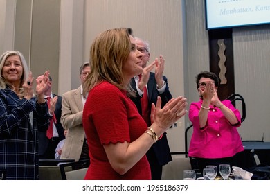 Manhattan Kansas, USA, April 24, 2021
Mercedes Schlapp applauds her husband Matt and Governor Kristi Noem at the annual Kansas State Republican Convention. Senator Jerry Moran (R-KS) is behind her. 