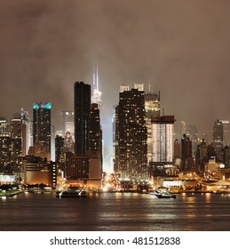 Manhattan Midtown Skyscrapers And New York City Skyline At Night With Fog