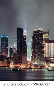 Manhattan Midtown Skyscrapers And New York City Skyline At Night With Fog