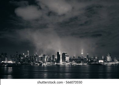 Manhattan Midtown Skyscrapers And New York City Skyline At Night With Fog