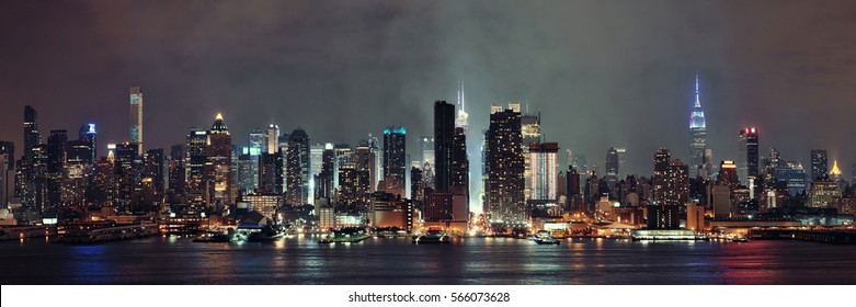 Manhattan Midtown Skyscrapers And New York City Skyline Panorama At Night With Fog