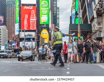 Manhattan New York 8.9.2019 Color Image New York Traffic Police Man  Directing Traffic Manhattan 