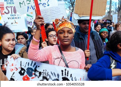 Manhattan, New York City / USA - March 24th 2018: March For Our Lives. Portrait Of African American Teen Protesting Holding Sign Up, Stop Gun Violence