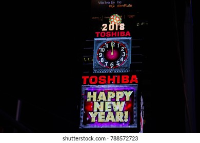 Manhattan: New York, January 1, 2018: Happy New Year And Midnight Clock Billboards On Buildings At Times Square In Nighttime