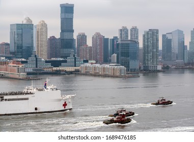 Manhattan, New York - March 30, 2020: USNS Comfort Hospital Ship Enters Manhattan 