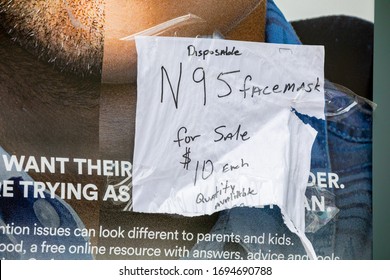 Manhattan, New York, USA - April 5, 2020: A Homemade Sign Selling N95 Masks At Price Gouging Inflated Prices Taped To A Bus Stop Billboard In Manhattan.