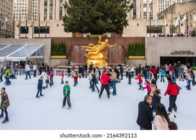 Manhattan, New York, USA - December 4, 2019: Lower Plaza Of Rockefeller Center With Ice Skating Rink And Christmas Tree