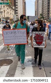 Manhattan, New York / USA - June 6, 2020: Protesters, Nurses, Doctors In Columbus Circle And Washington Square Park With Signs And Posters Marching And Protesting And Taking A Knee During Coronavirus