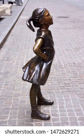 Manhattan, New York / USA - March 28 2019:  Fearless Girl Is A Bronze Sculpture By Kristen Visbal