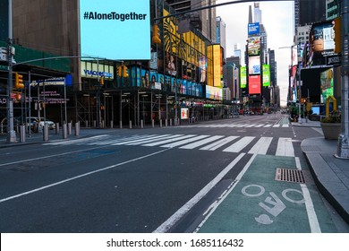 Manhattan. New York / USA - March 26 2020:
Empty streets of New York at Times Square 42nd street during pandemic virus Covid-19