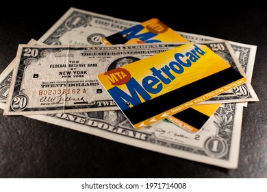 Manhattan, New York, USA - March 26. 2021: Metrocard On Old Twenty Dollar Banknote From New York Federal Reserve. NYC Metro Card Used On MTA Subway And Bus Public Transit