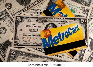 Manhattan, New York, USA - March 26. 2021: Metro Card On Dollar Bills. Price Of Subway Ticket In NYC. Concept Of Purchasing MTA Tickets