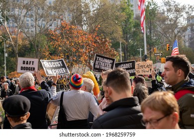 Manhattan, New York, USA - November 11. 2019: Trump protest during veteran Day in NYC. Impeach Trump signs during Donald Trump speech