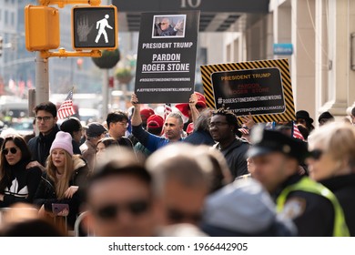 Manhattan, New York,USA - November 11. 2019: Pardon Roger Stone Signs Held Up During Veterans Day Parade In NYC. Call For President Trump To Pardon Roger Stone