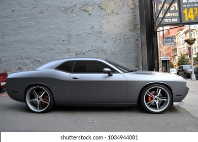  Manhattan, NY / United States - April 15, 2014: Silver Gray Dodge Challenger In New York Alley In Front Of Chipped Painted Wall.