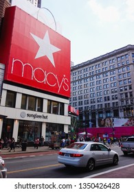 Manhattan, NYC / USA - 09 09 2012: Storefront Of Macy's Department Store And Sunglass Hut Shop At Herald Square Between Broadway And 34the Street With Cars And People Walking By