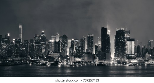 Manhattan Panorama Midtown Skyscrapers And New York City Skyline At Night With Fog