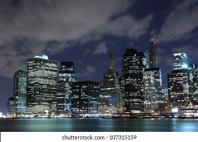 Manhattan Skyline At Night, New York City - Powered by Shutterstock