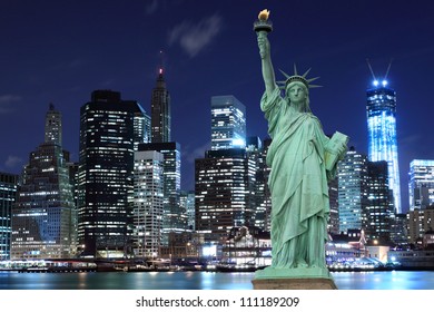 Manhattan Skyline and The Statue of Liberty at Night, New York City - Shutterstock ID 111189209