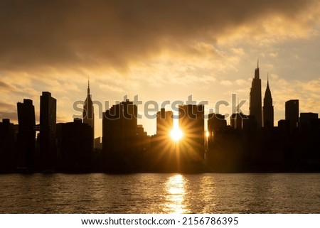 Manhattan skyscraper skyline sunset silhouette