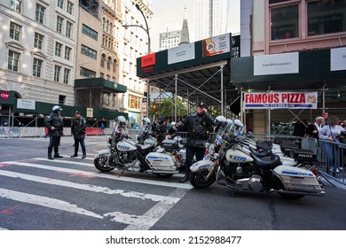 Manhattan, USA - 11. November 2021: NYPD Motorcycles Parked In New York City. New York Police Department. Police Officer Talking On Phone