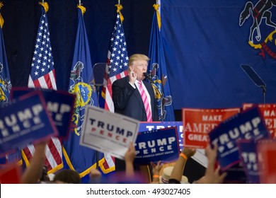 Manheim, PA - October 1, 2016: The oversized crowd waves signs as Donald J. Trump speaks at his campaign political rally Lancaster County.