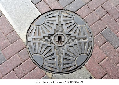Manhole cover in art deco style in Napier, New Zealand