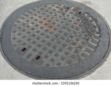 Manhole Cover On Concrete Street Draining Stock Photo 1595136250 ...