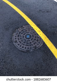 a manhole cover on the road