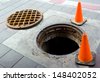 manhole cover open