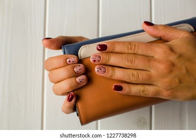 Manicure Burgundy Color. Nails Design. Nails With Hearts. Top View. Place For Text. St. Valentines Nails Concept.