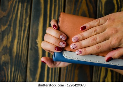 Manicure Burgundy Color. Nails Design. Nails With Hearts. Top View. Place For Text. St. Valentines Nails Concept.