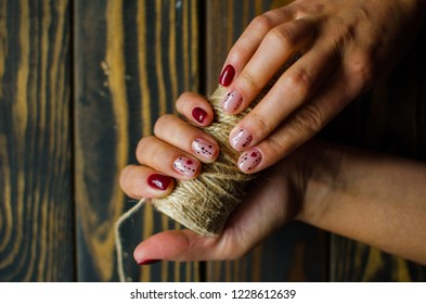 Manicure Burgundy Color. Nails Design. Nails With Hearts. Top View. Place For Text. St. Valentines Nails Concept.