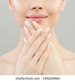 Manicure Concept. Woman Hands With White Nails Closeup