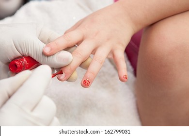 Manicure Does A Kid Nail With Red Color