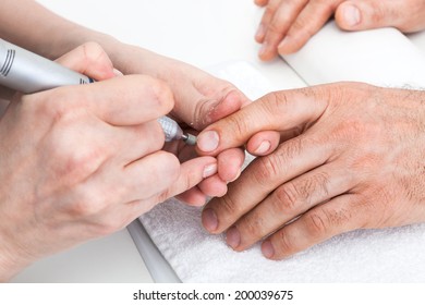 Manicure Male Hands In Beauty Salon