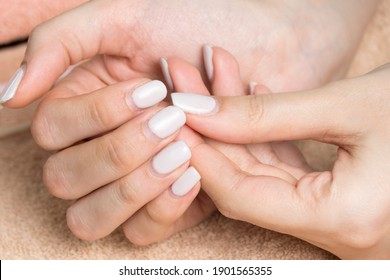 Manicure. Nude nail polish, classic. Overgrown nail polish. Manicure correction. An old manicure. Nail care. Beauty salon, SPA, procedure. Home nail care. Manicure tools. Beauty, lifestyle. 