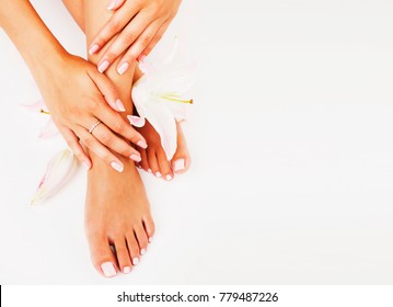 manicure pedicure with flower lily close up isolated on white perfect shape hands