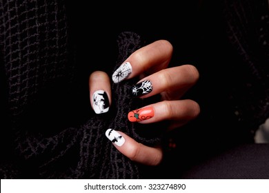 Manicured Nails With Halloween Patterned Nail Polish
