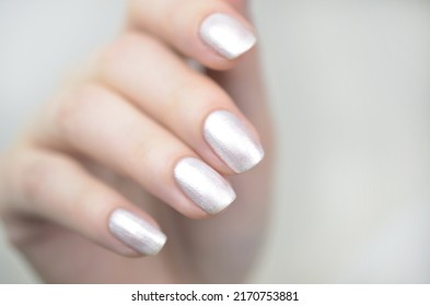 Manicured Nails With Pearlescent Nail Polish Isolated On White Background