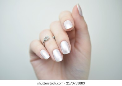 Manicured Nails With Pearlescent Nail Polish Isolated On White Background