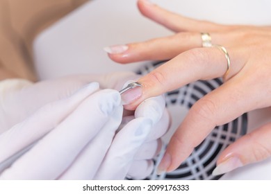 Manicurist With Gloves Uses A Cuticle Tool. Beauty Treatments, Manicure