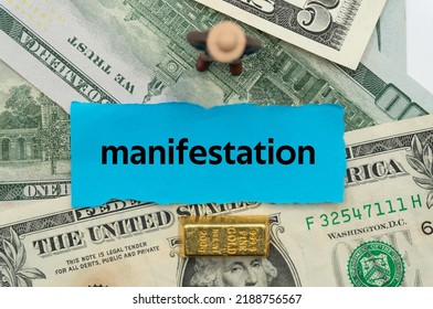 manifestation.The word is written on a slip of paper,on colored background. professional terms of finance, business words, economic phrases. concept of economy. - Shutterstock ID 2188756567