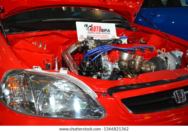 MANILA, PH - APR. 7: Red Honda Civic car\
engine at Manila International Auto Show on April 7, 2019 in World\
Trade Center, Manila,\
Philippines.