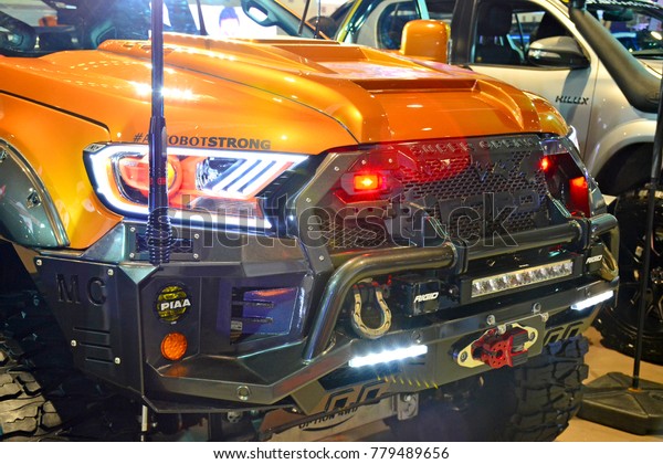 MANILA, PH - NOV. 30: Orange Ford Ranger Pick\
Up at Manila Auto Salon on November 30, 2017 in Manila,\
Philippines. Manila Auto Salon is a annual gathering exhibit for\
automotive aftermarket\
industry.
