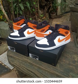 Manila, Ph - Oct 2019, Jordan 1 Mid Starfish. Famous For Its Resemblance To The Shattered Backboard, The Touch Of Orange, Black And White Gives The Hype For The Sneakerhead. Must Cop Sneaker The Year