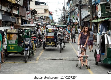 Manila / Philippines 03 18 2018: Filipino People Having Their Daily Life In The Streets Of Pasai.