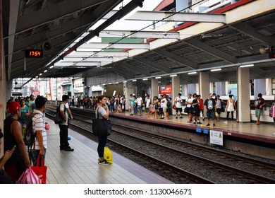 Manila, Philippines - 08/12/2017; People Are Waiting To Board A Train At The LRT Carriedo Station.